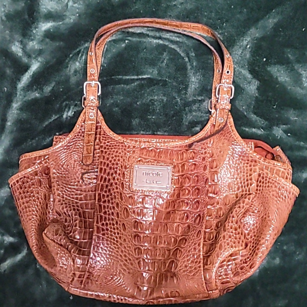 Nicole Miller snakeskin design handbag